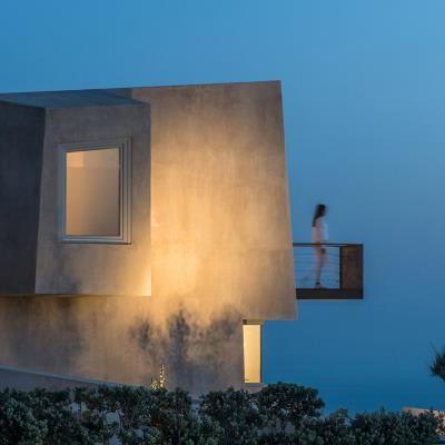 Kapsimalis Architects completes cave-like summer residence on the outskirts of Pyrgos