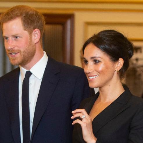 Meghan Markle wows in black tuxedo mini dress for an evening at the musical Hamilton with Prince Harry