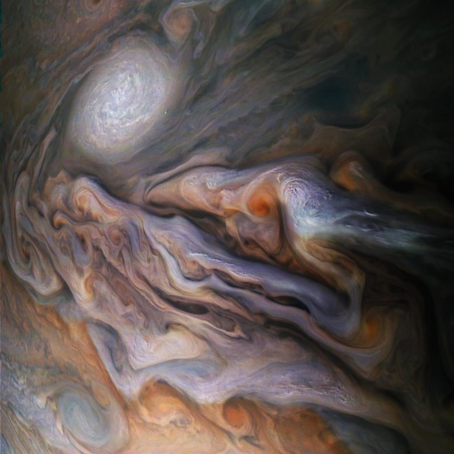 Jupiter's Magnificent Swirling Clouds. (color-enhanced) Credit:NASA