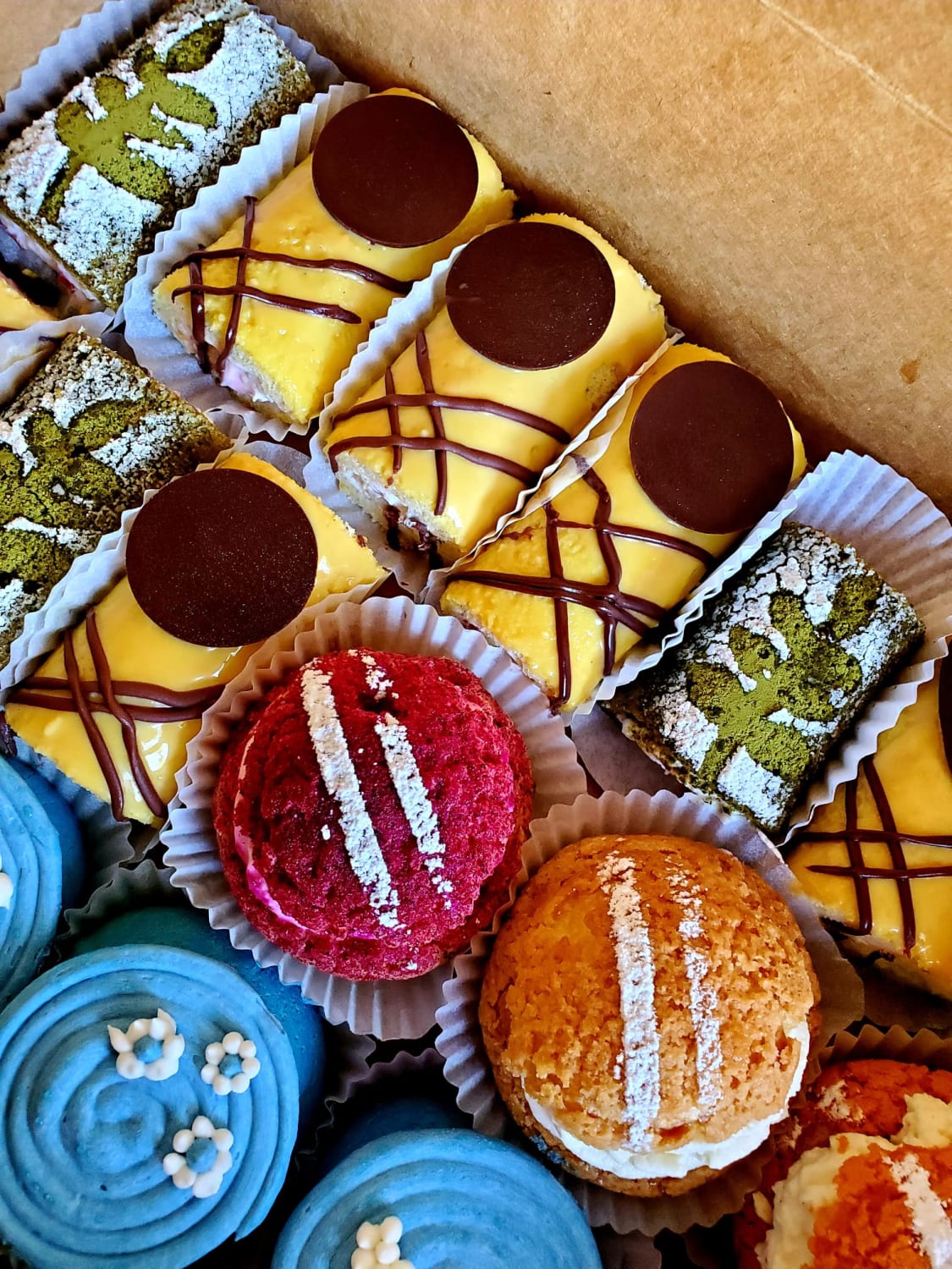 Mini Japanese roll cakes, craquelin cream puffs, and entremets