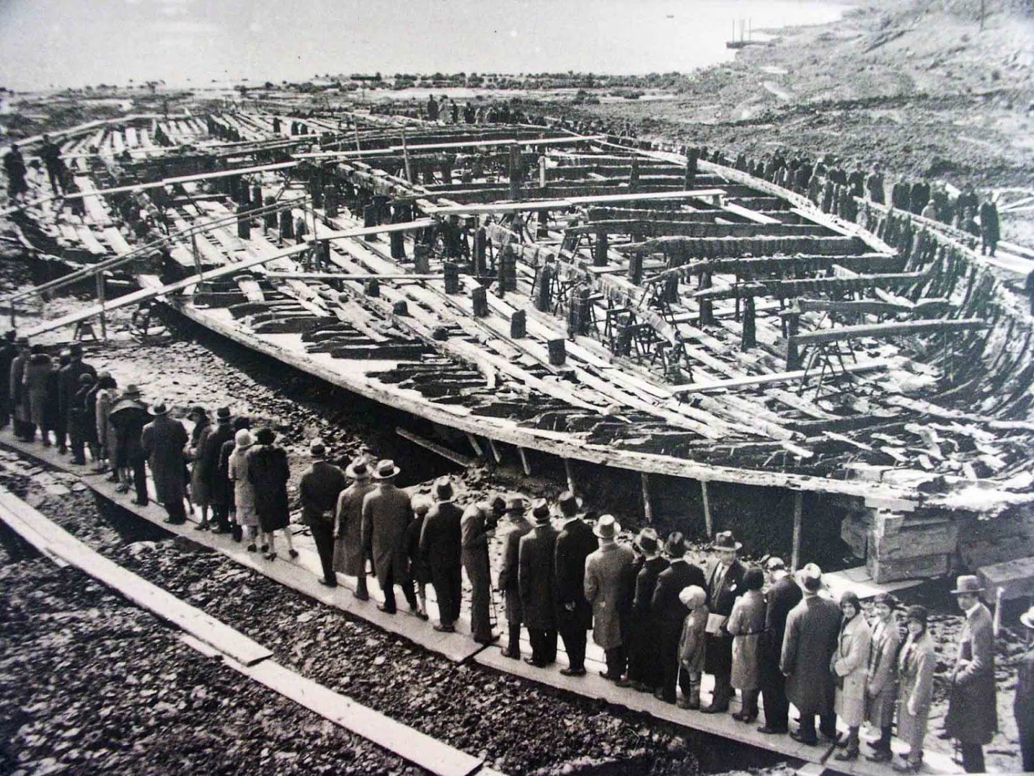 Italians viewing emperor Caligula's Nemi ships, 1932