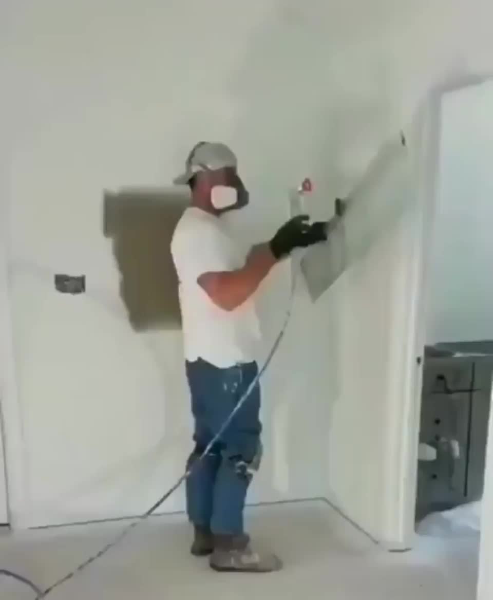 Painter showing off his tools
