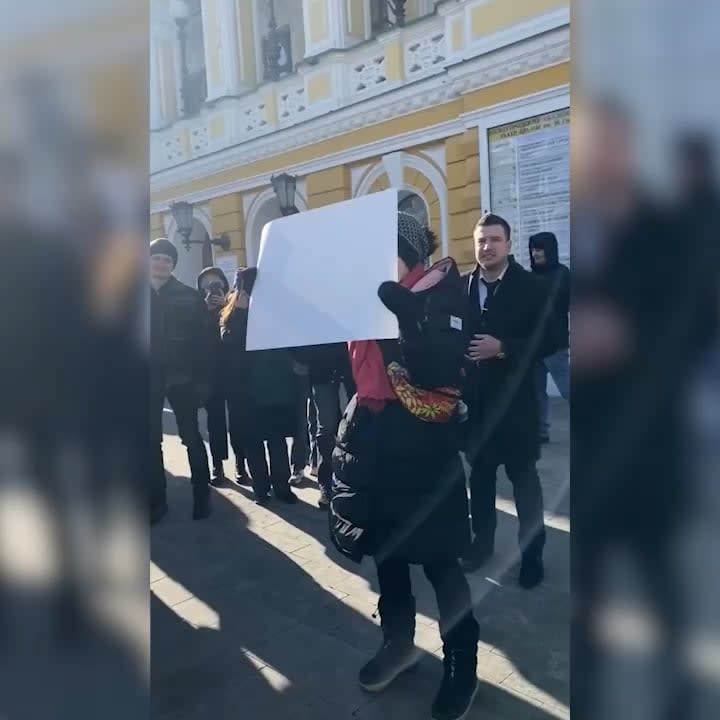 to protest against the war with an empty poster in Russia