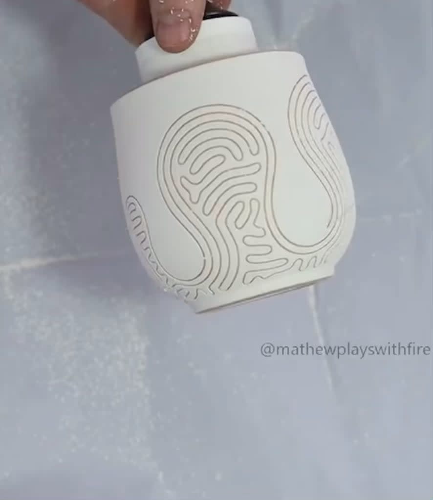 Pottery tape pulling.