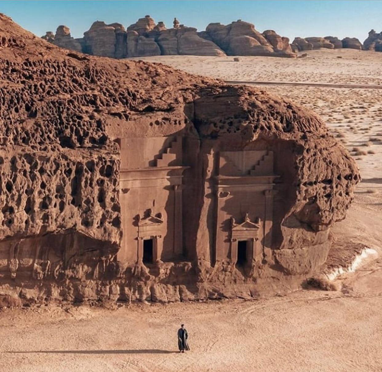 Ancient tombs built into the rock in the Arabian desert
