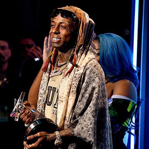 Lil Wayne Gives Emotional Speech About the Cop Who Saved His Life