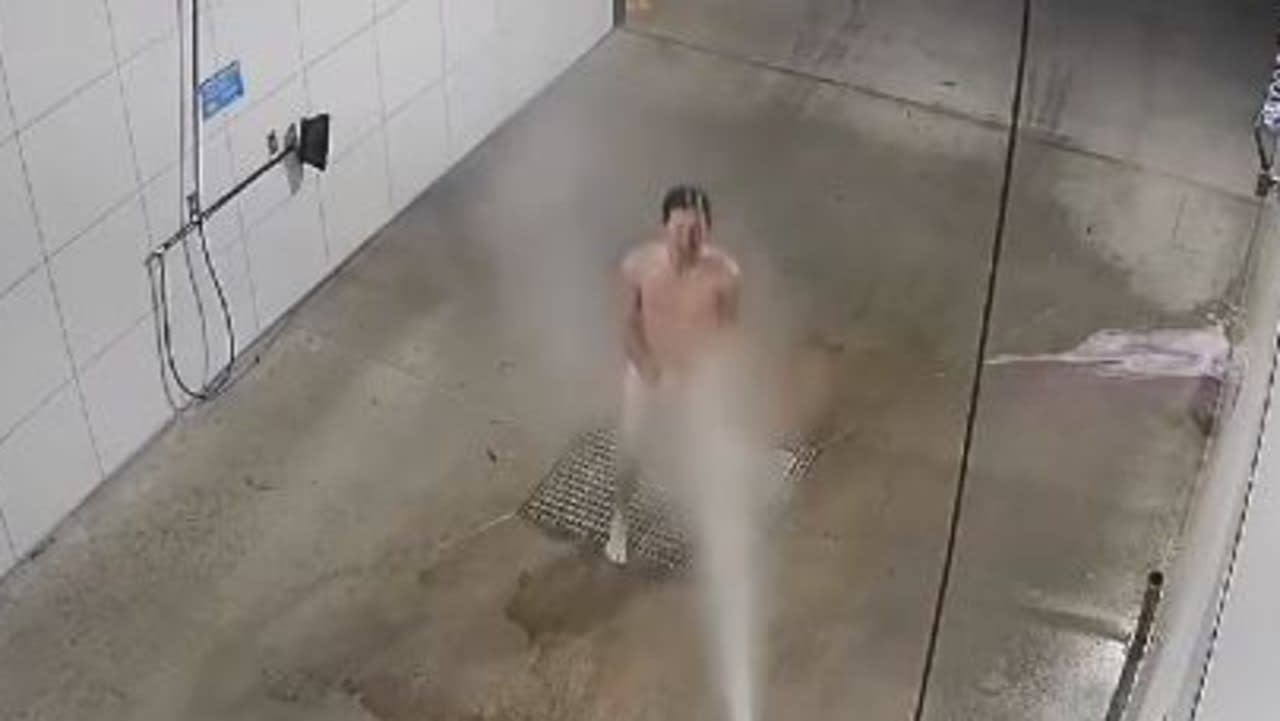 Naked man caught on CCTV video showering in Sunshine Coast car wash