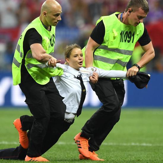 Pussy Riot Members Detained After Running Onto the Field in World Cup Final, Police Say