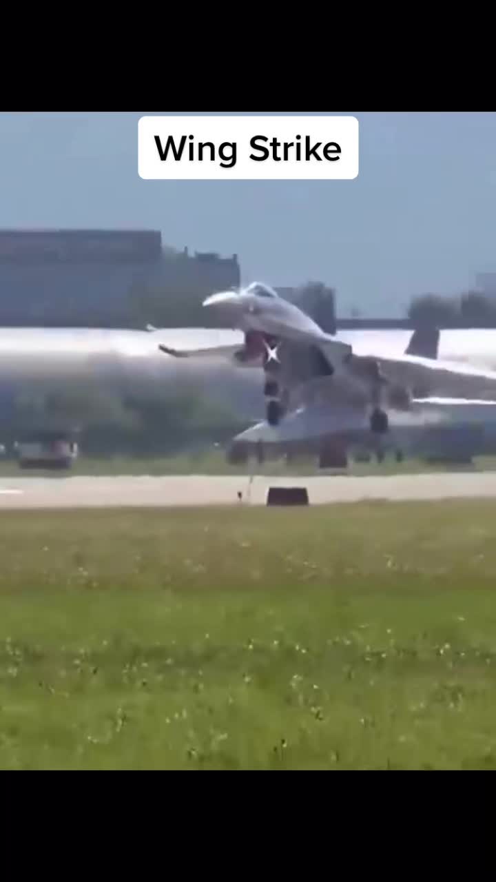 Fighter jet strikes wing while landing.