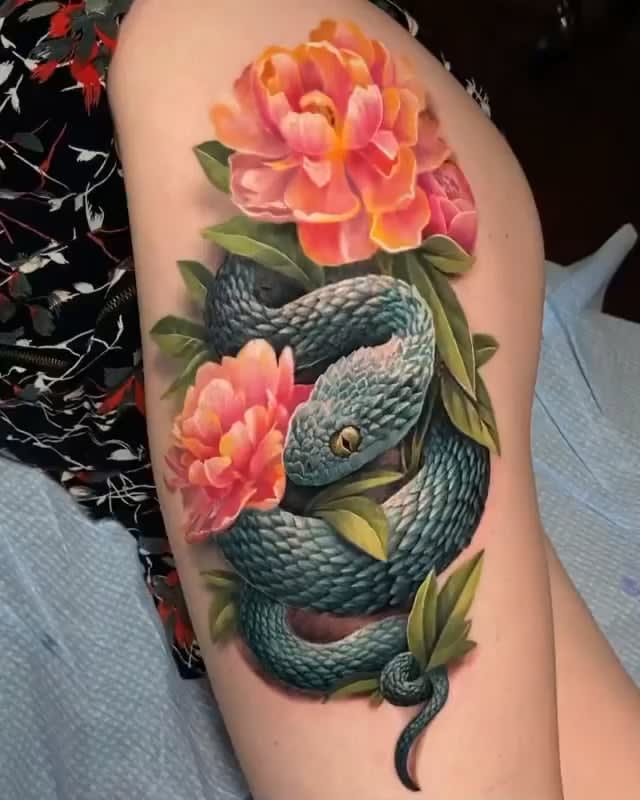 Snake tattoo by Adriana Hallow at Inkology Tattoo Art Gallery, NY