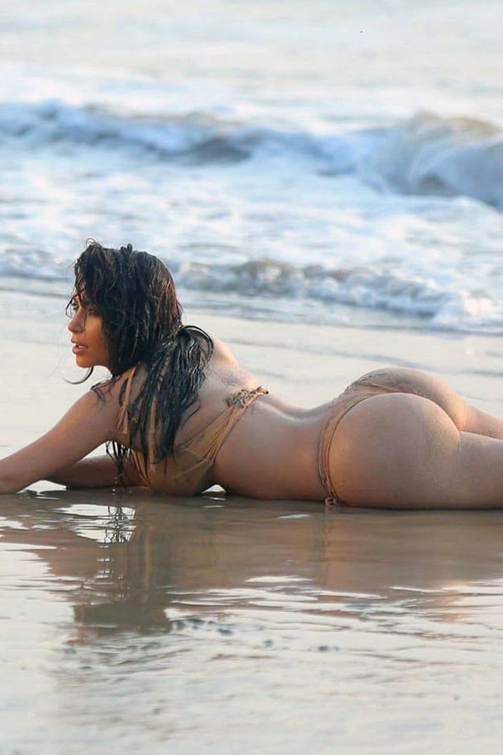 Dangerous Curves Ahead: 70 of Kim Kardashian's Hottest Swimsuit Photos