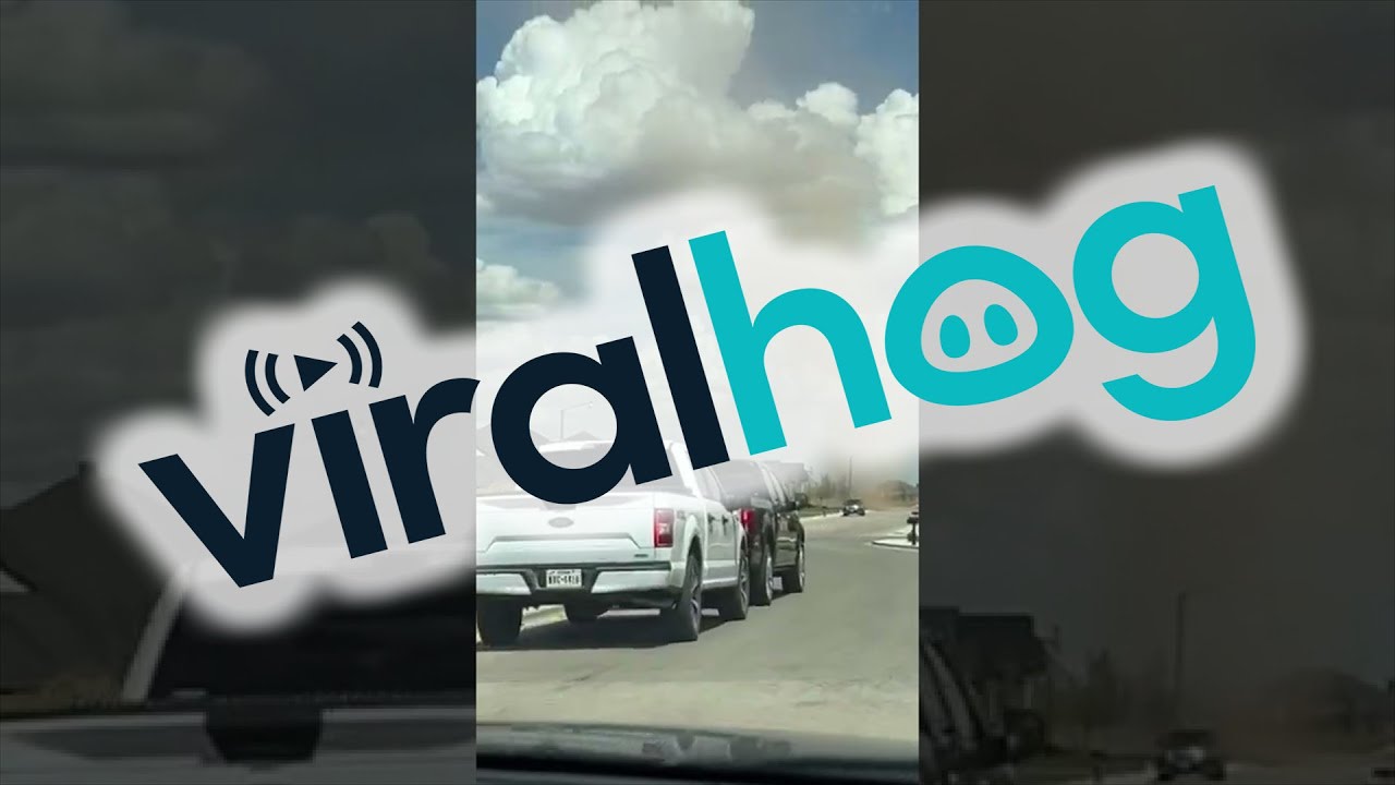 Driving Through a Dust Devil || ViralHog