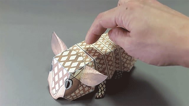 Handmade paper toys by Haruki Nakamura spring, fold, and jump into action