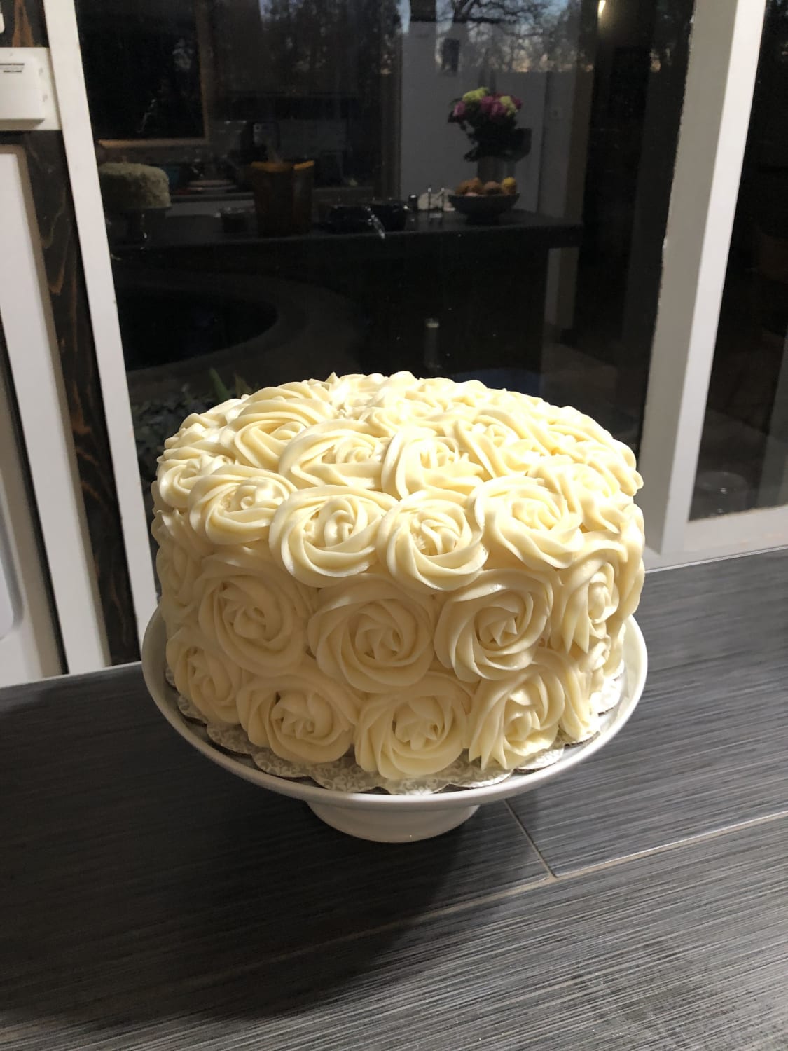Red velvet cake with cream cheese frosting rosettes to celebrate my daughter graduating from high school