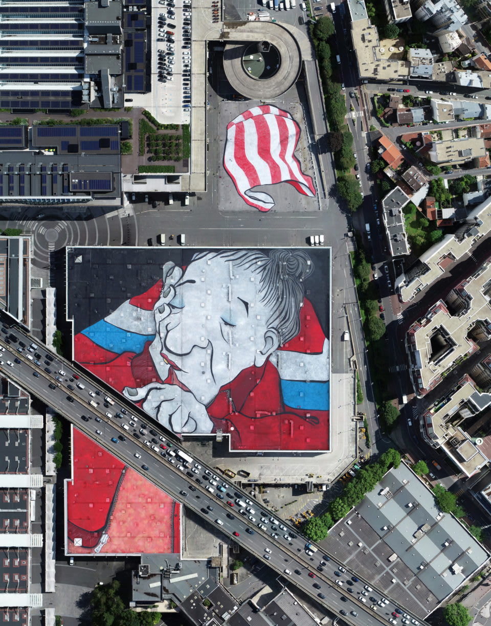 Large Scale Murals of Resting Giants Painted on Streets and Rooftops by Ella & Pitr — Colossal