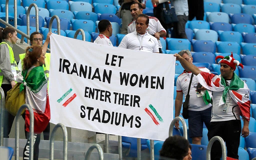 Iran arrests female photojournalist for attending soccer game dressed as a man