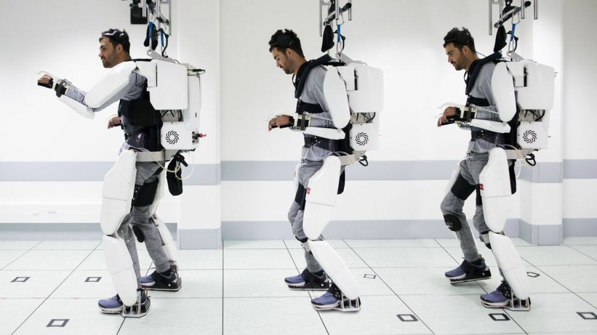 A paralyzed man walked with a brain-controlled exoskeleton