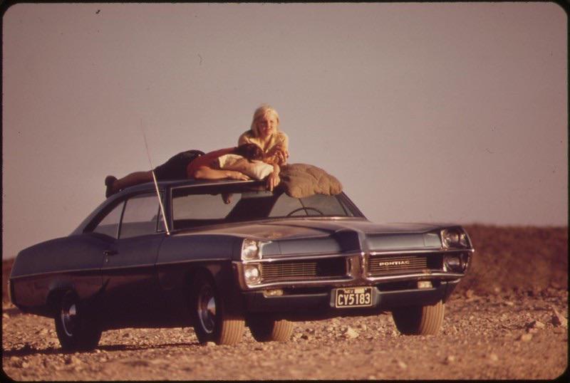 Visitors sunbathing at Lake Mead, May 1972, Nevada.