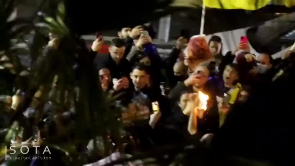 Near the Russian consulate in Tel Aviv, Russian citizens burn their passports in support of Ukraine