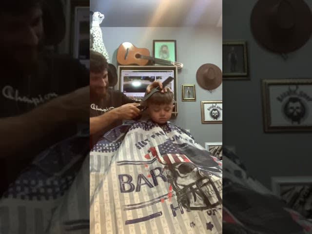 Little Boy Falls Asleep While Getting His Hair Cut By Barber - 1200925