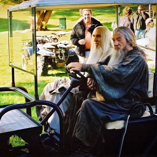 PsBattle: Christopher Lee and Ian McKellen driving a golf cart on set of "Lord of the Rings"