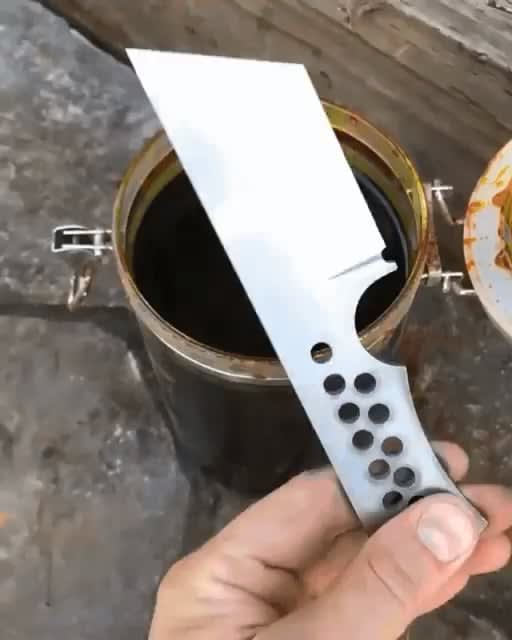 Acid etching a knife blade