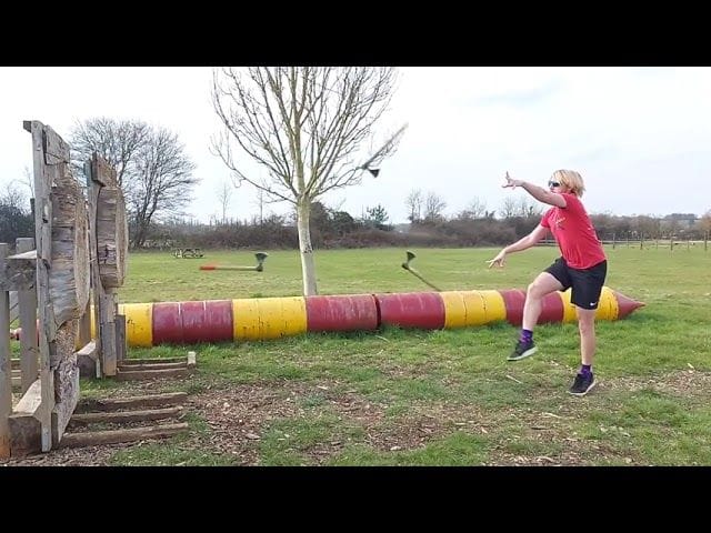 Man Displays Trick By Hitting Target After Throwing Three Axes ...