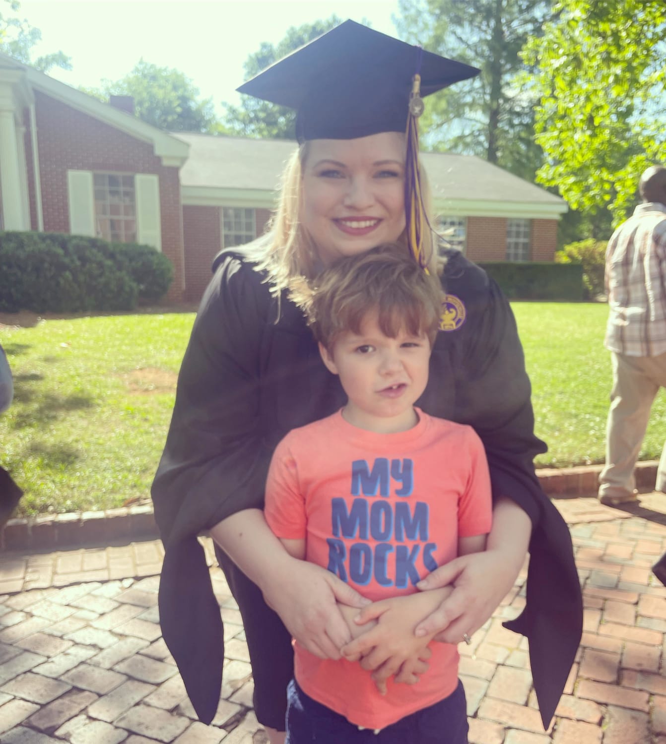 15 years ago, I almost didn’t graduate from high school. Today, I finished my Master’s degree. This little dude is my “why.”
