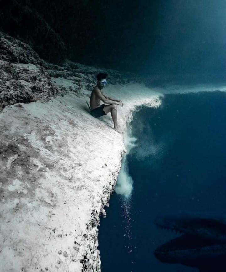 I edited that pic of the guy sitting on the underwater cliff to be a bit more thalassophobic...