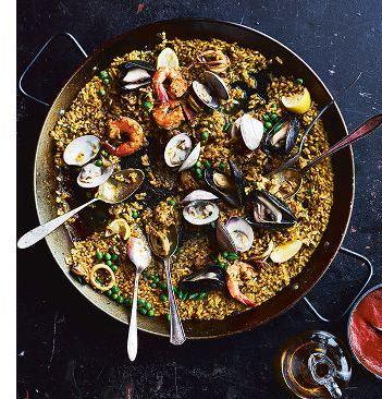 This Garlicky Seafood Paella Is Like a Great End-of-Summer Party in a Pan