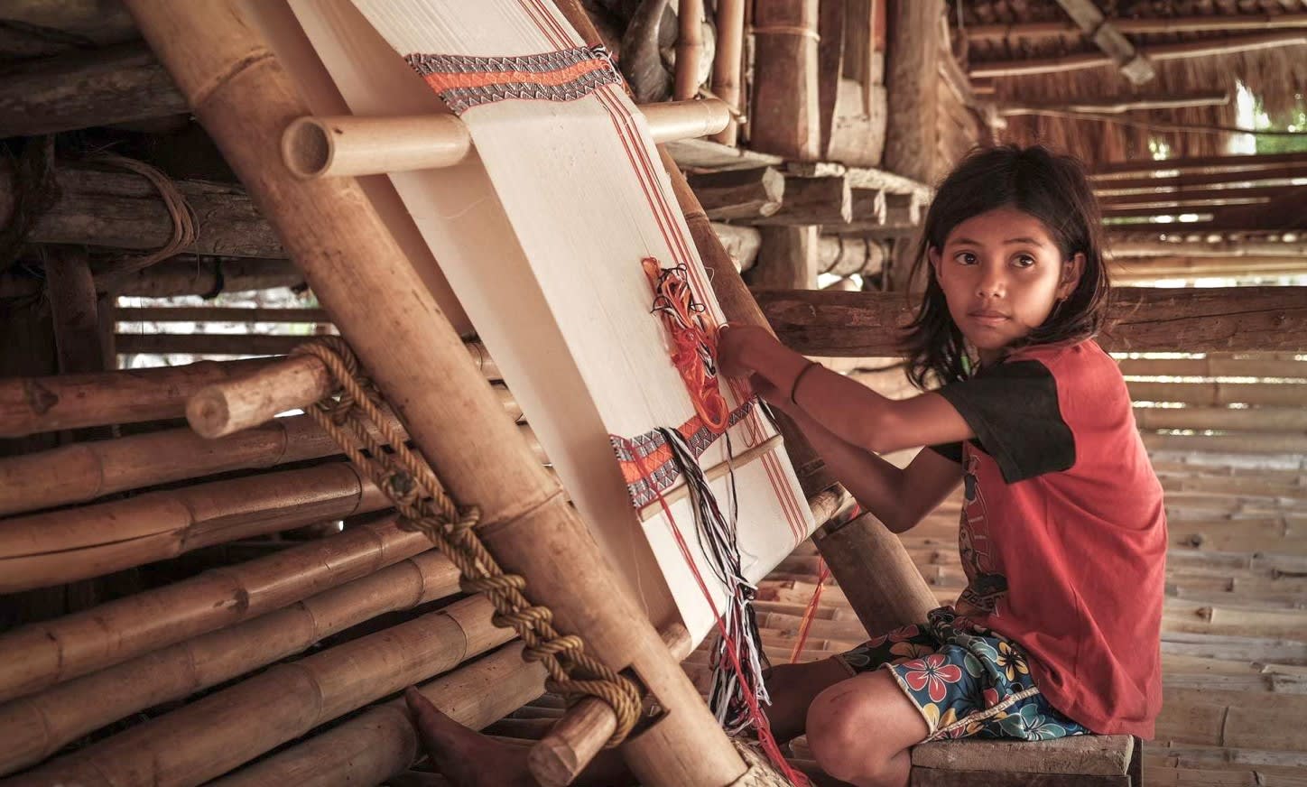 Girl learning tapestry art, Sumba Island, Indonesia. (Image - Mangalika Ghosh).