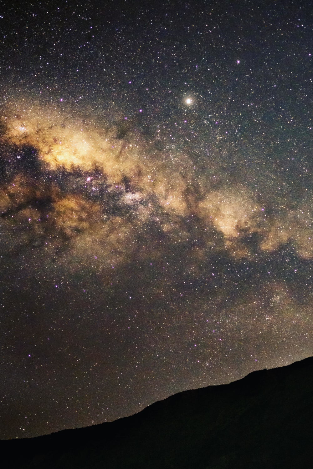 Captured Jupiter over the Milky Way belt near Red Rocks, New Zealand the other night. Couldn't believe this was 15 minutes from the city's center.