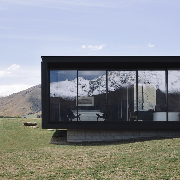 A Striking Black House Appears to Float in the New Zealand Mountains