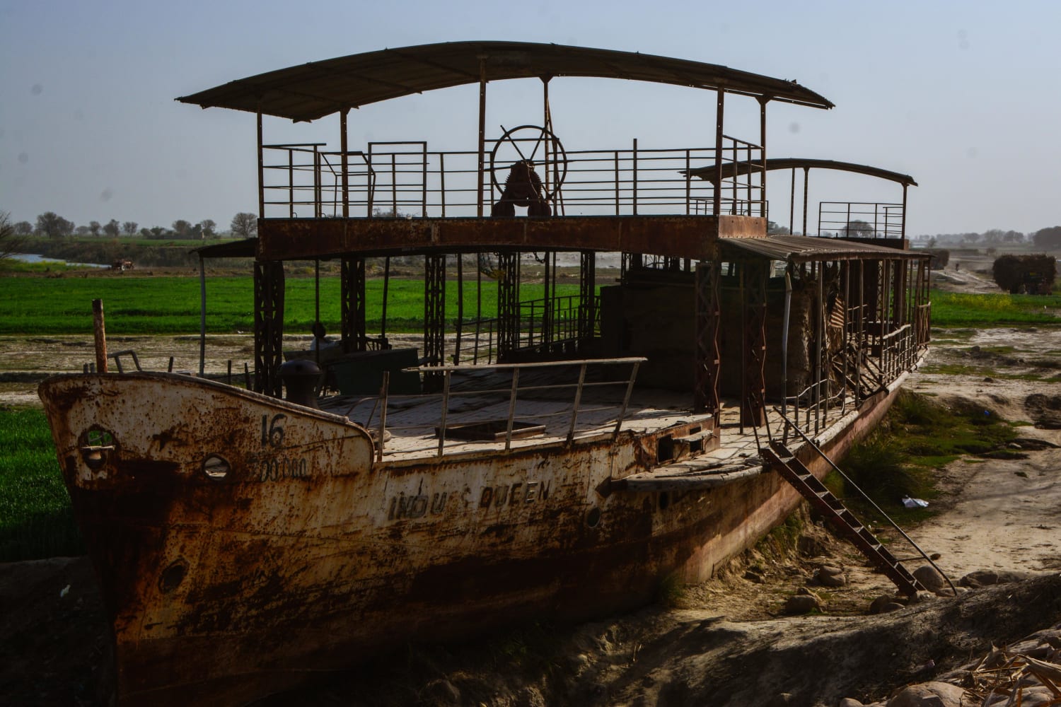 The Indus Queen, once a royal pleasure steamer, left abandoned in rural Punjab, Pakistan.