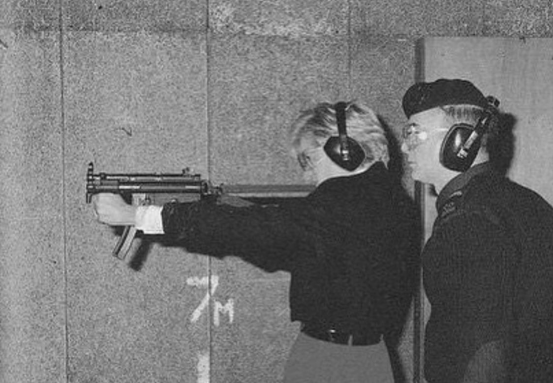 Princess Diana being trained to shoot an MP5K (1980s)