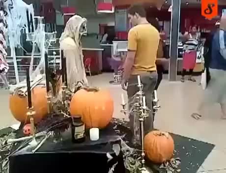 This is how to trick a trickster in halloween. Look how worried that lady in black. So unexpecting reaction though.