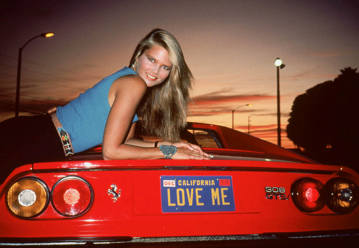 Christie Brinkley with the Ferrari 308 she drove in National Lampoons Vacation from 1983