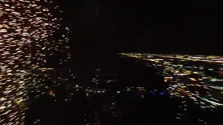 A drone flying through fireworks