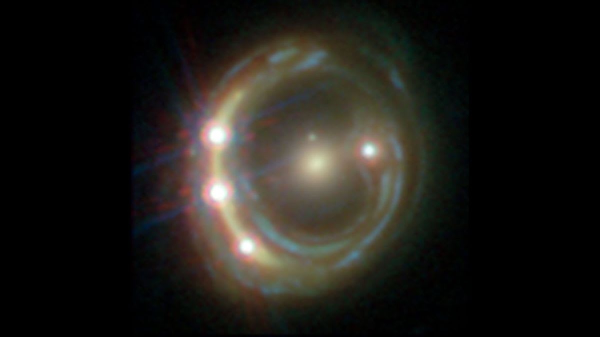Einstein's Gravitational Lenses Could Clear Up Roiling Debate on Expanding Cosmos