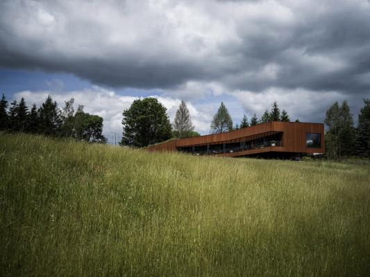 Medusa Group completes corten steel house overlooking the Otryt Mountain in Poland