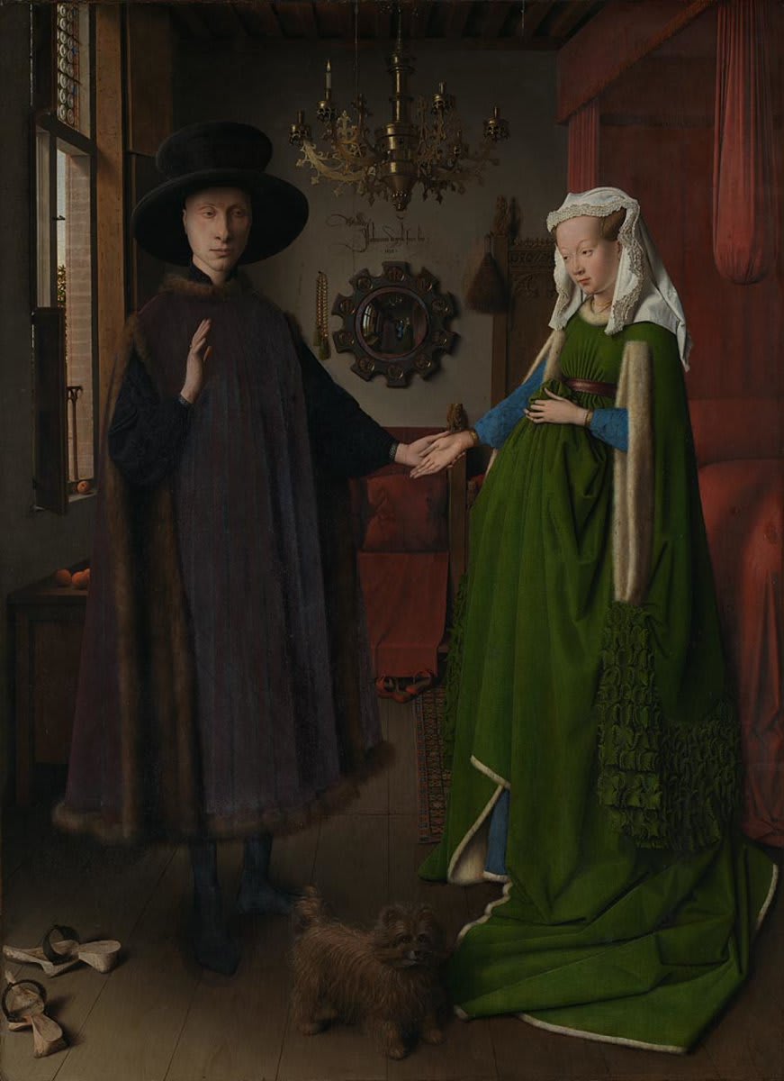 Jan van Eyck died OnThisDay in 1441. His painting, 'The Arnolfini Portrait' must be one of the most intriguing paintings in the world. A richly dressed man and woman stand in a room. They are probably Giovanni di Nicolao di Arnolfini and his wife, whose identity is unknown.