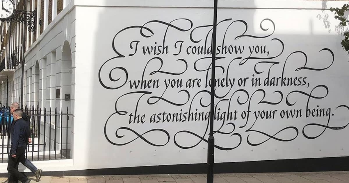 Elegant Calligraphy Mural Greets Passersby With an Uplifting Quote From a 14th Century Poet