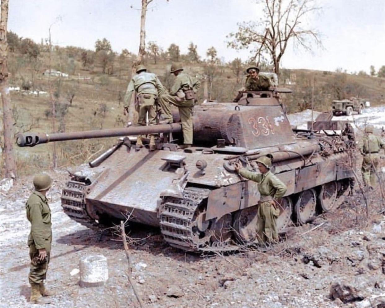 An abandoned Panther being inspected by American soldiers northeast of Pico, Frosinone, Italy, 1944