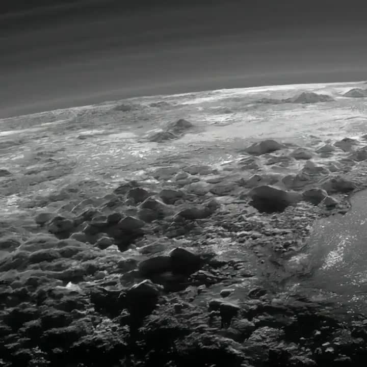 Pluto’s ice mountains, frozen plains and layers of atmospheric haze as seen by the New Horizons spacecraft.