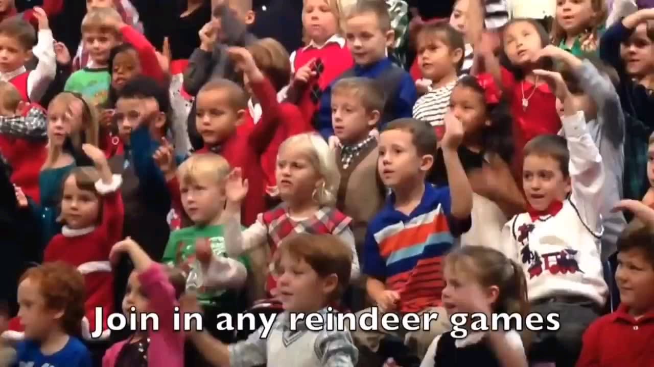 Little girl sings the Christmas song for her deaf parents using sign language