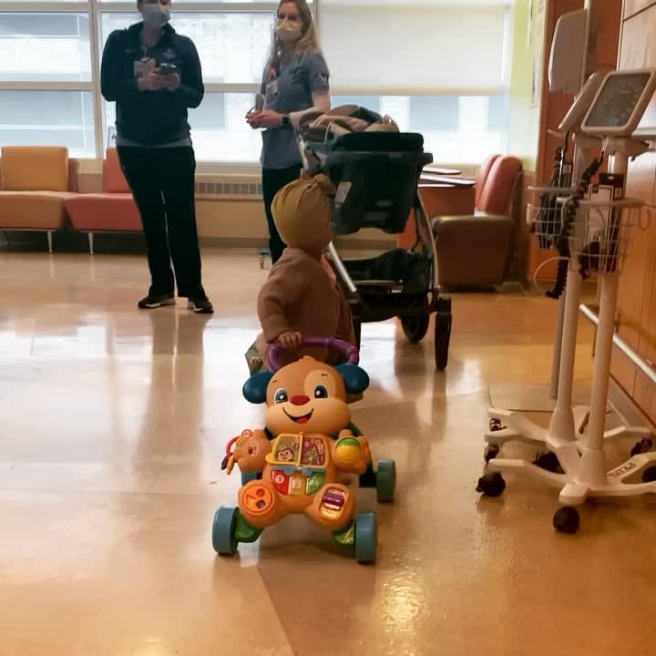 My 20 month old daughter walking out of her 8th and final round of chemo after battling a rare form of kidney cancer for the last 7 months