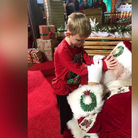 Mom captures the magical moment when blind son visits Santa Claus