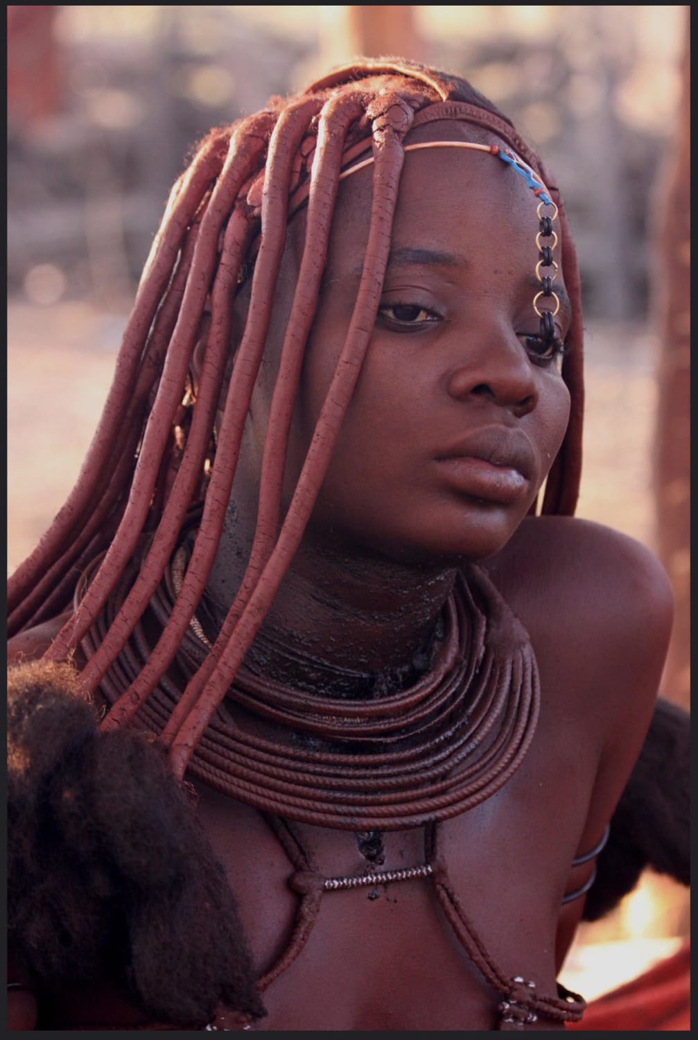 Himba woman. The Himba are indigenous peoples with an estimated population of about 50,000 people living in northern Namibia, in the Kunene Region and on the other side of the Kunene River in southern Angola.