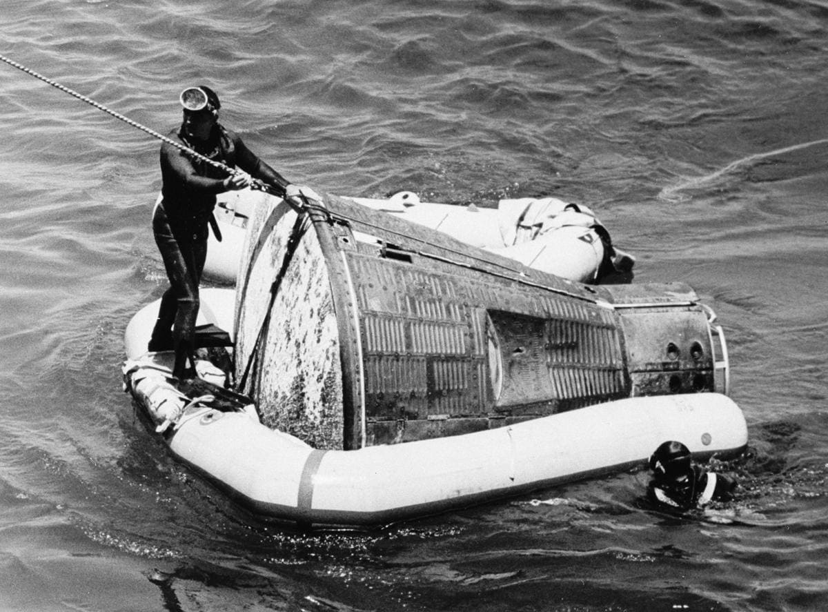 U.S. Navy divers recover the Gemini 5 spacecraft and astronauts Gordon Cooper and Charles Conrad from the Atlantic Ocean - August 29, 1965 AP