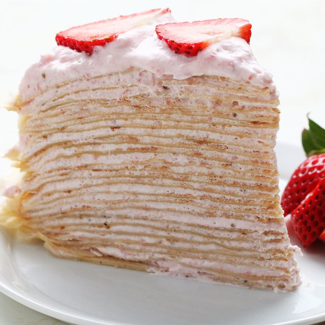 Strawberry Banana Crepe Cake filled with sweet cream. 😋 Shop the recipe!